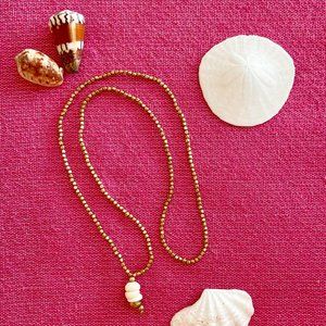 PUKA AND BRASS BEAD NECKLACE